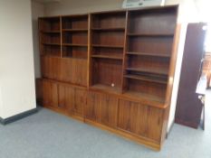 A mid century Danish twin section bookcase fitted bureau and cupboards beneath