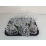 A tray of assorted drinking glasses,