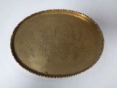 A Japanese etched brass sake tray