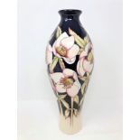 A modern Moorcroft 'Hellebore' pattern baluster vase, designed by Nicola Slaney,