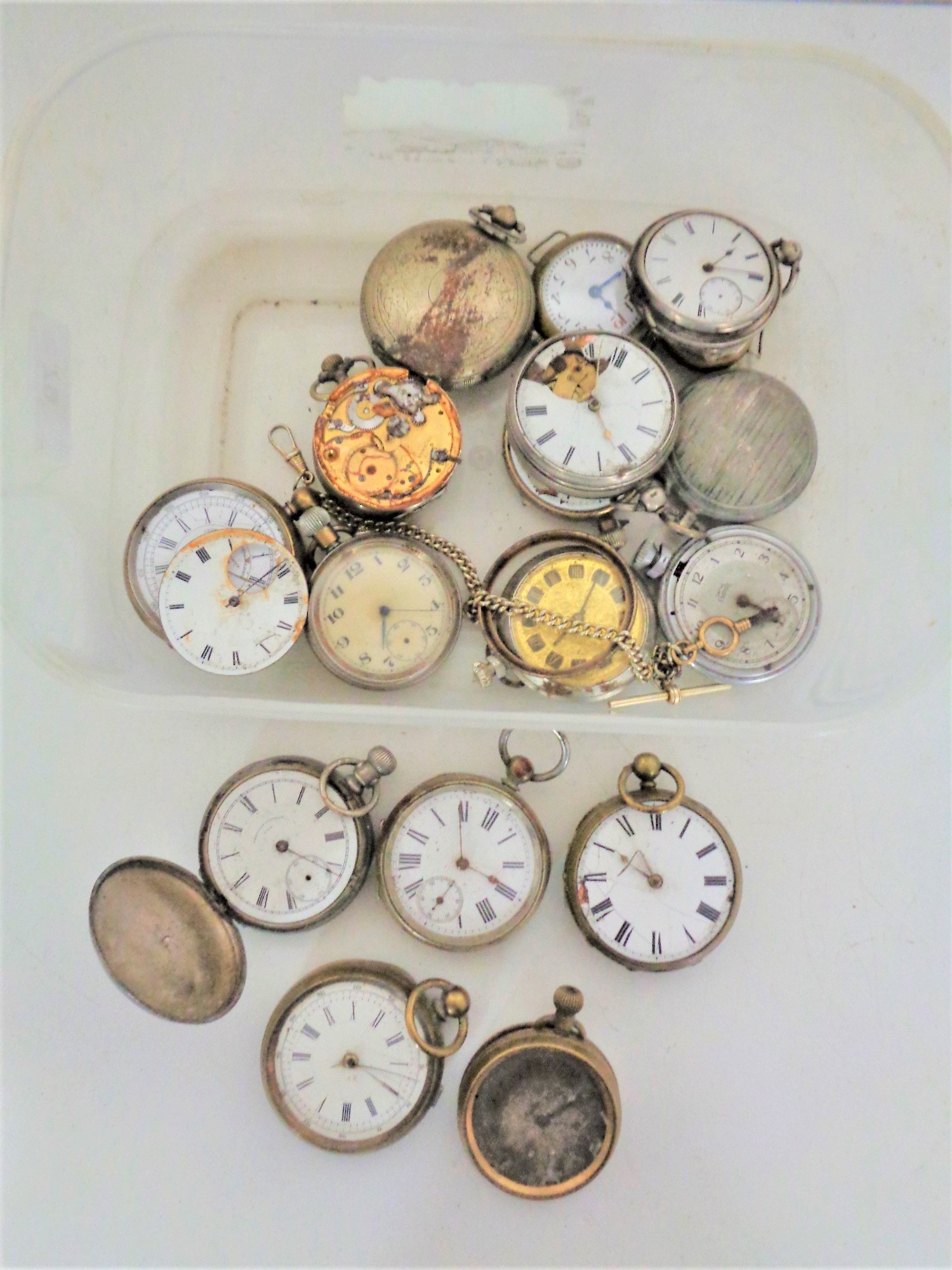 A quantity of antique and later pocket watches and two wrist watches (for restoration).