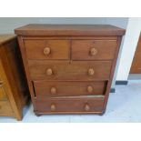 A Victorian pine five drawer chest