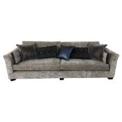 A high quality contemporary four-seater settee, in champagne-silver upholstery,