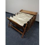 A 20th century oak framed pull out camp bed.