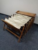 A 20th century oak framed pull out camp bed.