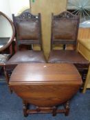 A pair of Edwardian dining chairs together with an Old Charm oak drop leaf occasional table.