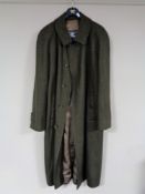 A Gents Burberry woolen three quarter length coat, tartan pattern, on original Burberry hanger,