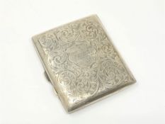 A silver cigarette case 'Presented to Hubert W. Harward, Manager, The Pavillion, Lavender Hill S.W.