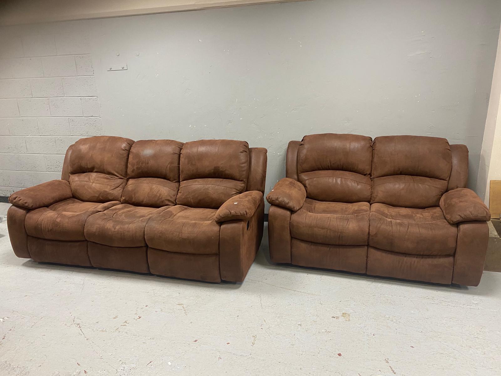 A contemporary three seater manual reclining settee in brown suede-type fabric with matching two