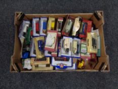 A box containing mainly boxed die cast vehicles to include Oxford die cast, Lledo Days Gone etc.