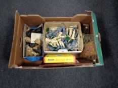 A box containing resin and pottery chess pieces, glass chess board with pieces,