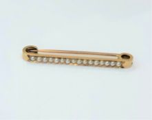 A 15ct gold pearl set bar brooch CONDITION REPORT: 4.