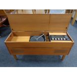 A teak cased stereo sound music system with Garrard turntable in teak cabinet