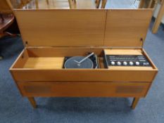 A teak cased stereo sound music system with Garrard turntable in teak cabinet