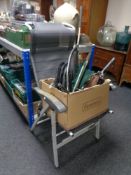 A folding fishing chair together with a box containing a Walker rod holder,