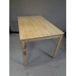 An Ikea pine kitchen table