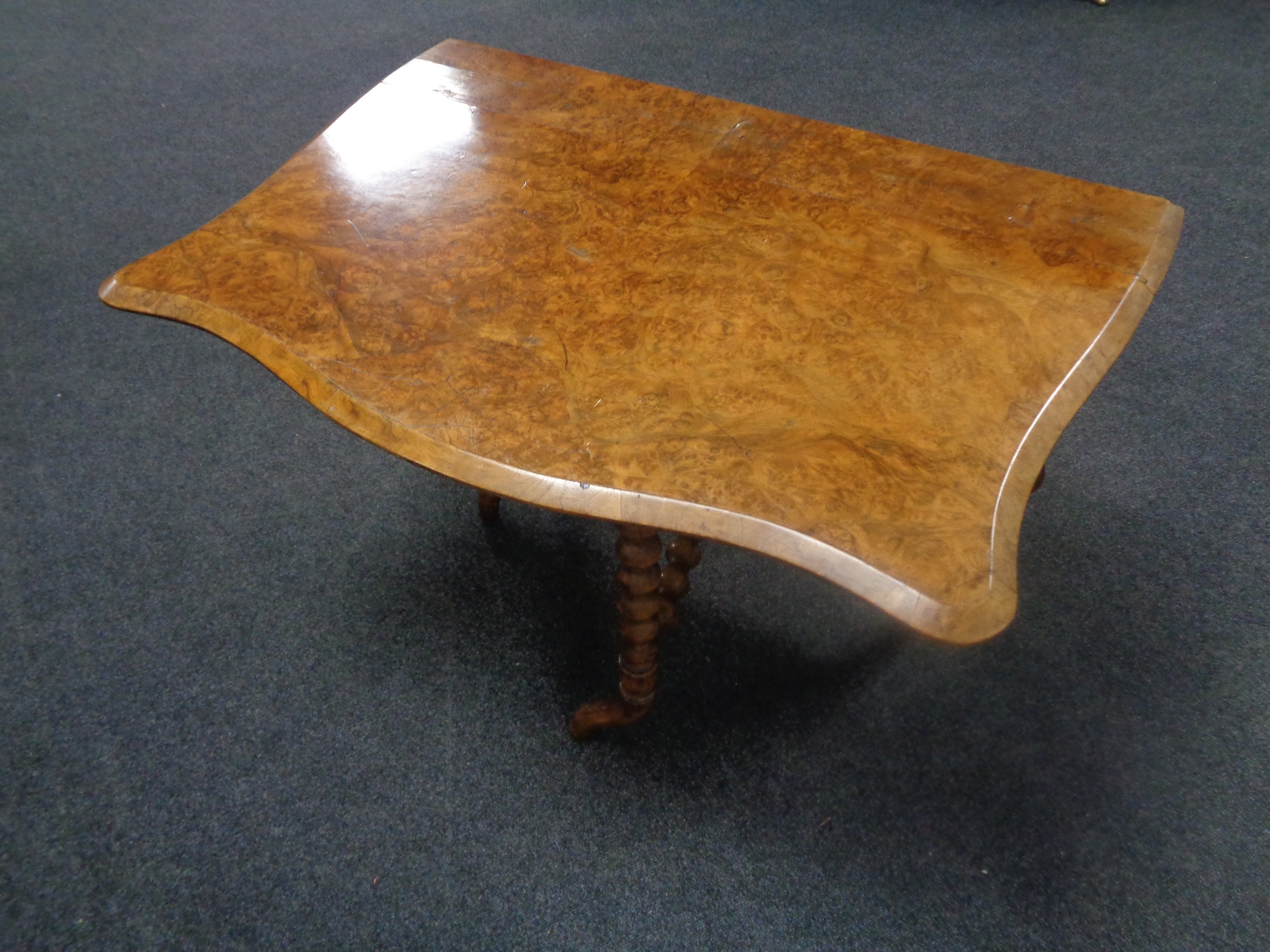 A Victorian walnut Sutherland table.