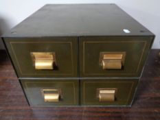 A mid 20th century steel four drawer desktop index chest.
