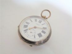 A silver pocket watch, Birmingham 1909.