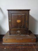 An Edwardian smoker's cabinet together with an oak cutlery canteen and a pipe rack in the form of a