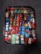 A tray of mid 20th century and later play worn die cast vehicles including Dinky, Lesney,