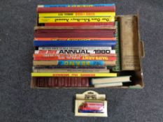 A box containing books and children's annuals to include Dan Dare, school boy's album,