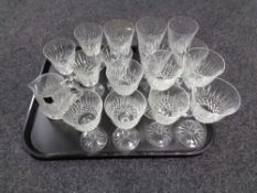 A tray of sixteen assorted Edinburgh crystal wine glasses together with a jug
