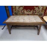 A 20th century continental tiled top coffee table