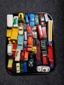 A tray of mid 20th century and later play worn die cast vehicles including Dinky Toys conveyancer,