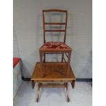 An Edwardian mahogany bedroom chair together with a sofa coffee table, fitted two drawers.