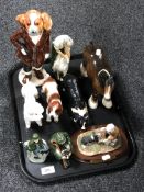 A tray of assorted figurines to include Japanese dogs, Beswick shire horse,
