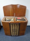 A mid 20th century Regentone radiogram in walnut cabinet.