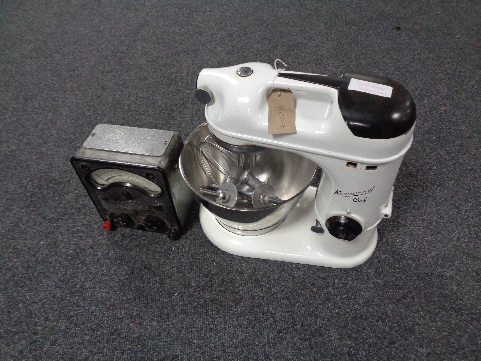 A mid 20th century Kenwood Chef food mixer with bowl and accessories,