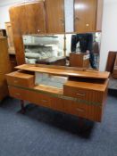 A mid 20th century teak dressing table.