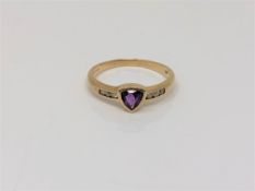 A 9ct gold amethyst and diamond ring, size P CONDITION REPORT: 1.