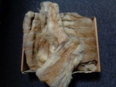 A vintage fur coat with matching hat and gloves by Marcus of London.