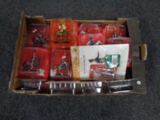A box containing 25 Delprado Napoleonic figures in packaging, one with magazine.
