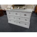 A painted pine glass top seven drawer chest.