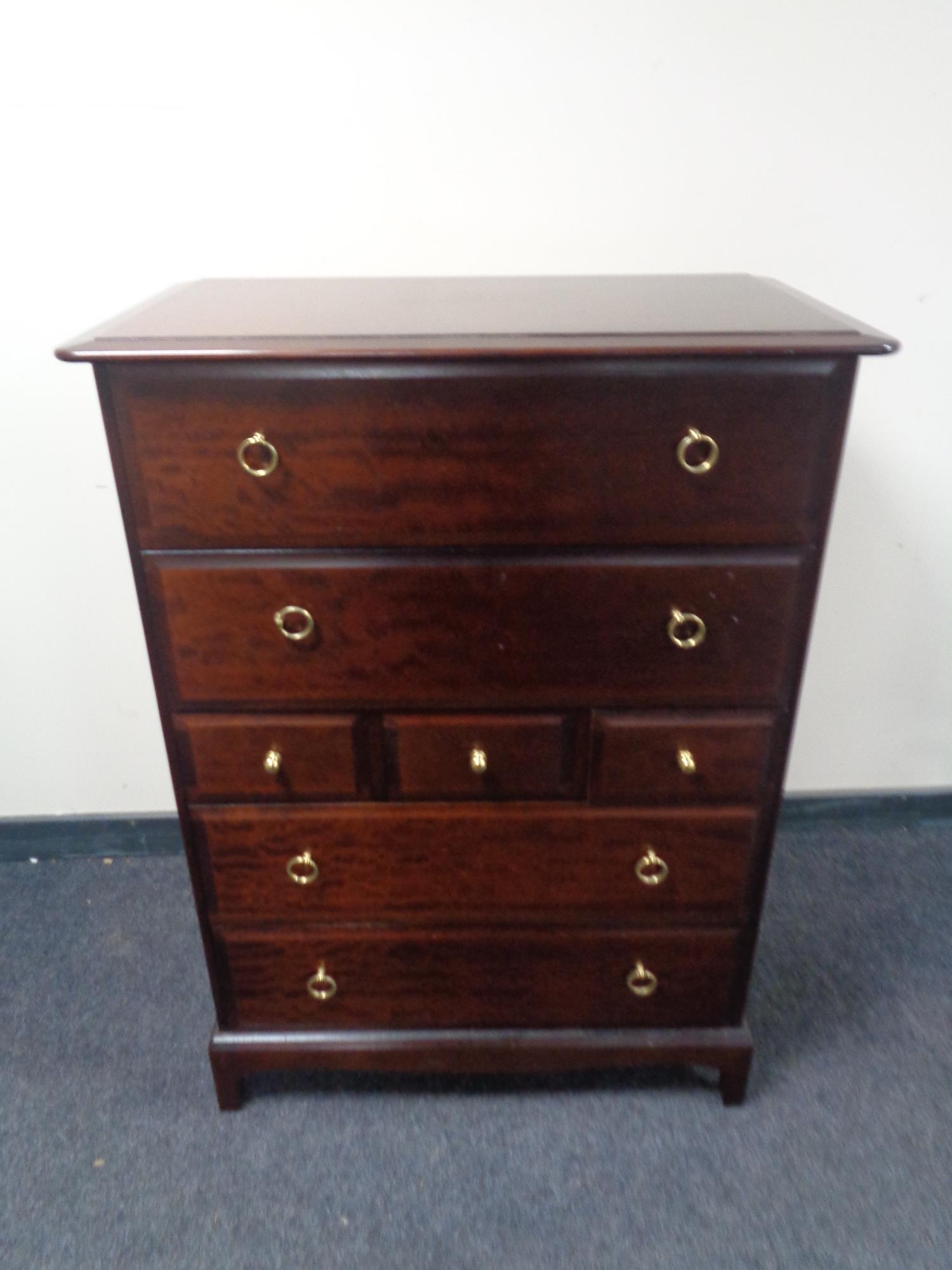 A Stag Minstrel seven drawer chest