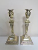 A pair of late 19th century silver plated Neo-classical candlesticks,