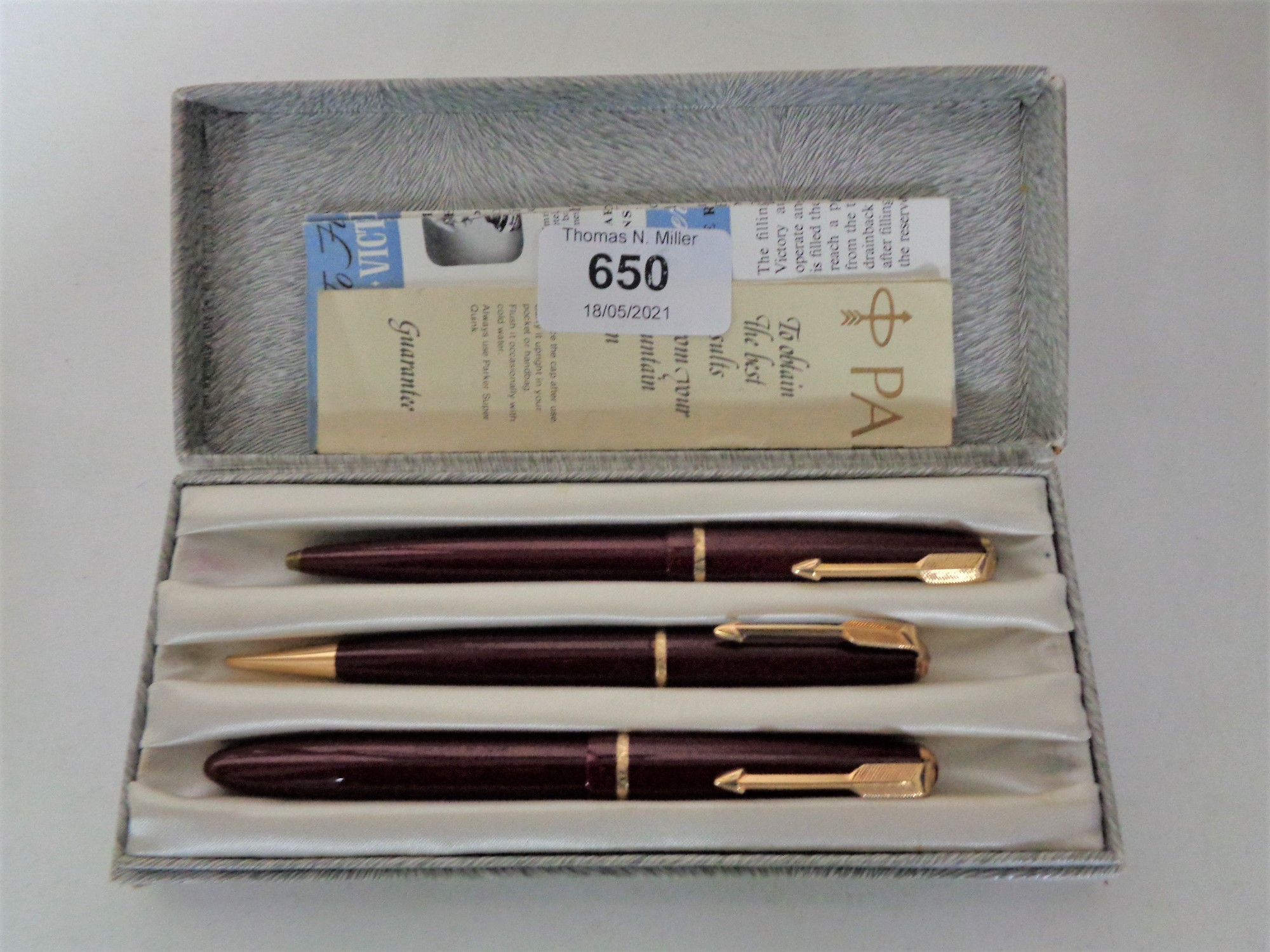 A cased three piece Parker pen set, fountain pen with 14ct gold nib.