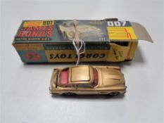 A vintage Corgi die cast vehicle - Model 261 James Bond's Aston Martin D.B.