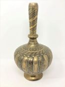 A 19th century Indo-Persian brass bulbous vase, height 30cm.