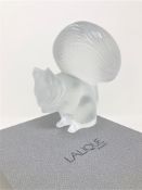 A Lalique crystal figure - Squirrel, height 11 cm, with original grey retail box.