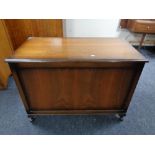 A 20th century walnut blanket chest.