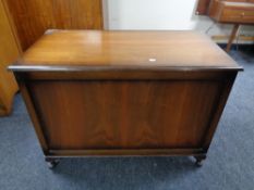 A 20th century walnut blanket chest.