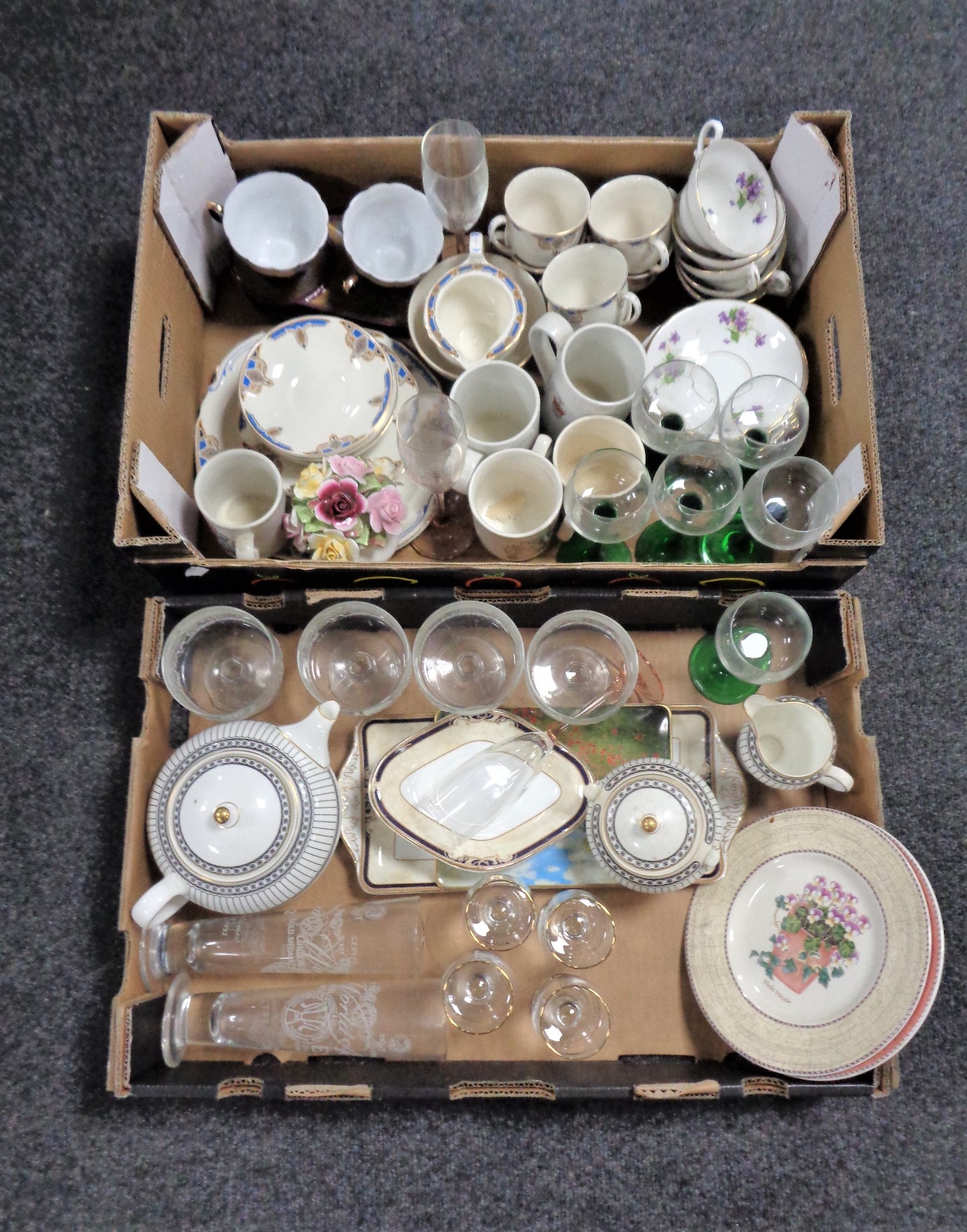 Two boxes containing miscellaneous glassware, part Wedgwood dinner services, tea china,
