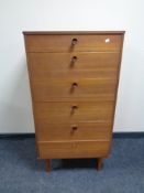 A mid 20th century teak six drawer chest.