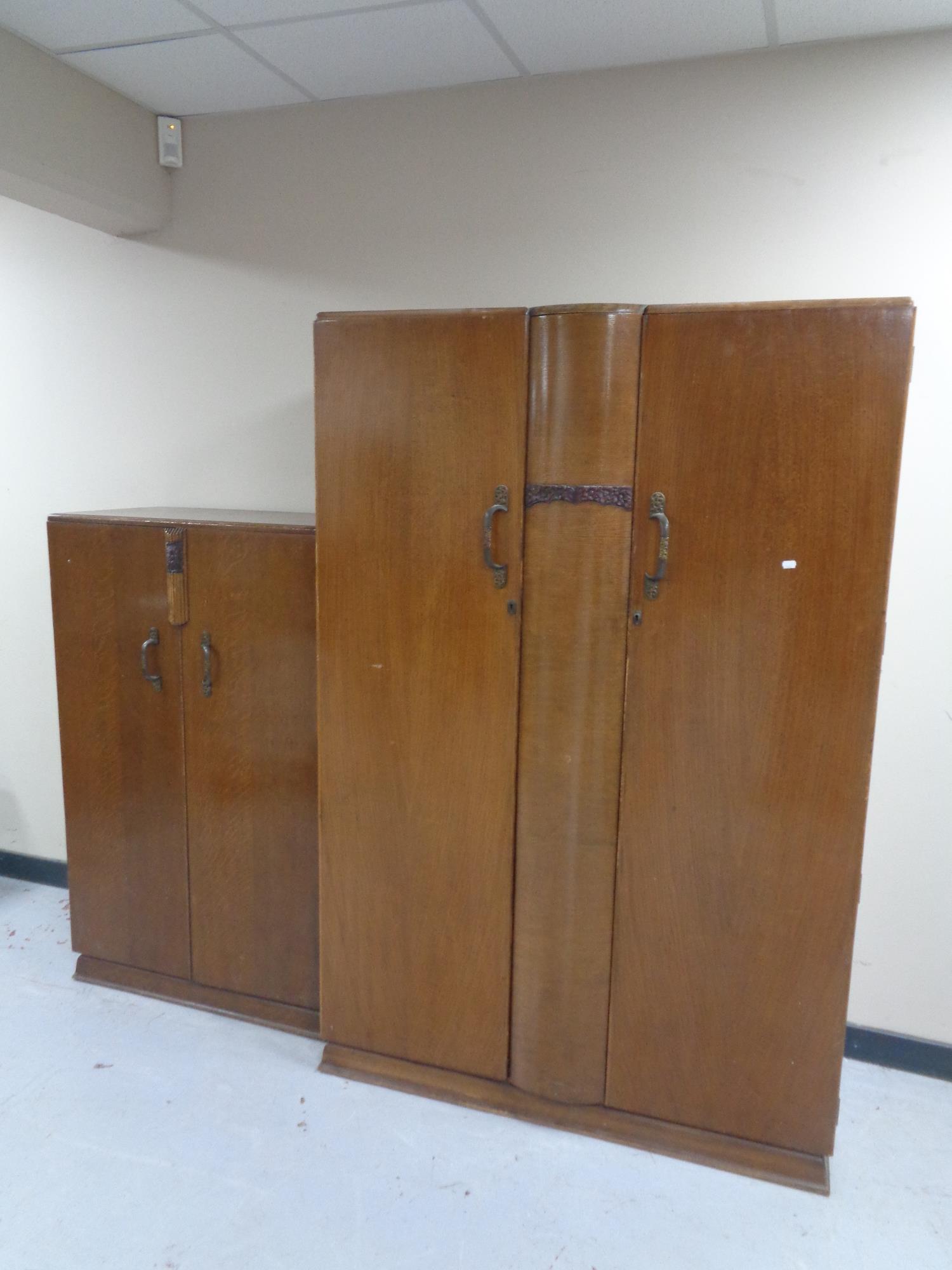 A 20th century Distinctive Furniture lady's and gents wardrobe.