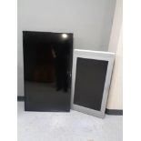 A Panasonic 50'' LCD TV together with a further Acoustic Solutions LCD TV, no table stands.